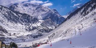 Candanchú ski resort in Aragon, Spain - panoramic view of ski slopes and mountain facilities
