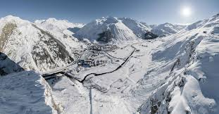 Andermatt ski resort in Uri, Switzerland - panoramic view of ski slopes and mountain facilities
