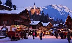 Gstaad ski resort in Bernese Oberland, Switzerland - panoramic view of ski slopes and mountain facilities