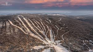 Le Massif de Charlevoix ski resort in Quebec, Canada - panoramic view of ski slopes and mountain facilities