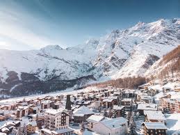 Saas-Fee ski resort in Valais, Switzerland - panoramic view of ski slopes and mountain facilities