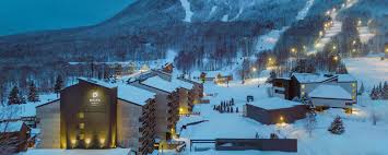 Ski Mont-Sainte-Anne ski resort in Quebec, Canada - panoramic view of ski slopes and mountain facilities