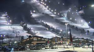 Stoneham Mountain Resort ski resort in Quebec, Canada - panoramic view of ski slopes and mountain facilities