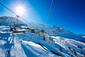 Courmayeur ski resort in Valle d'Aosta, Italy - panoramic view of ski slopes and mountain facilities