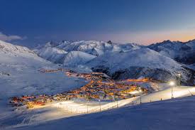 Alpe d'Huez ski resort in Isère, France - panoramic view of ski slopes and mountain facilities