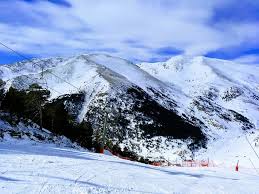 Vall de Núria ski resort in Catalonia, Spain - panoramic view of ski slopes and mountain facilities
