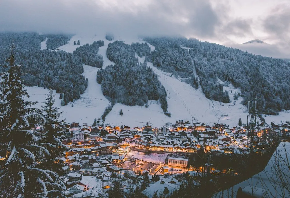 Morzine ski resort in Portes du Soleil, Haute-Savoie, France - panoramic view of ski slopes and mountain facilities