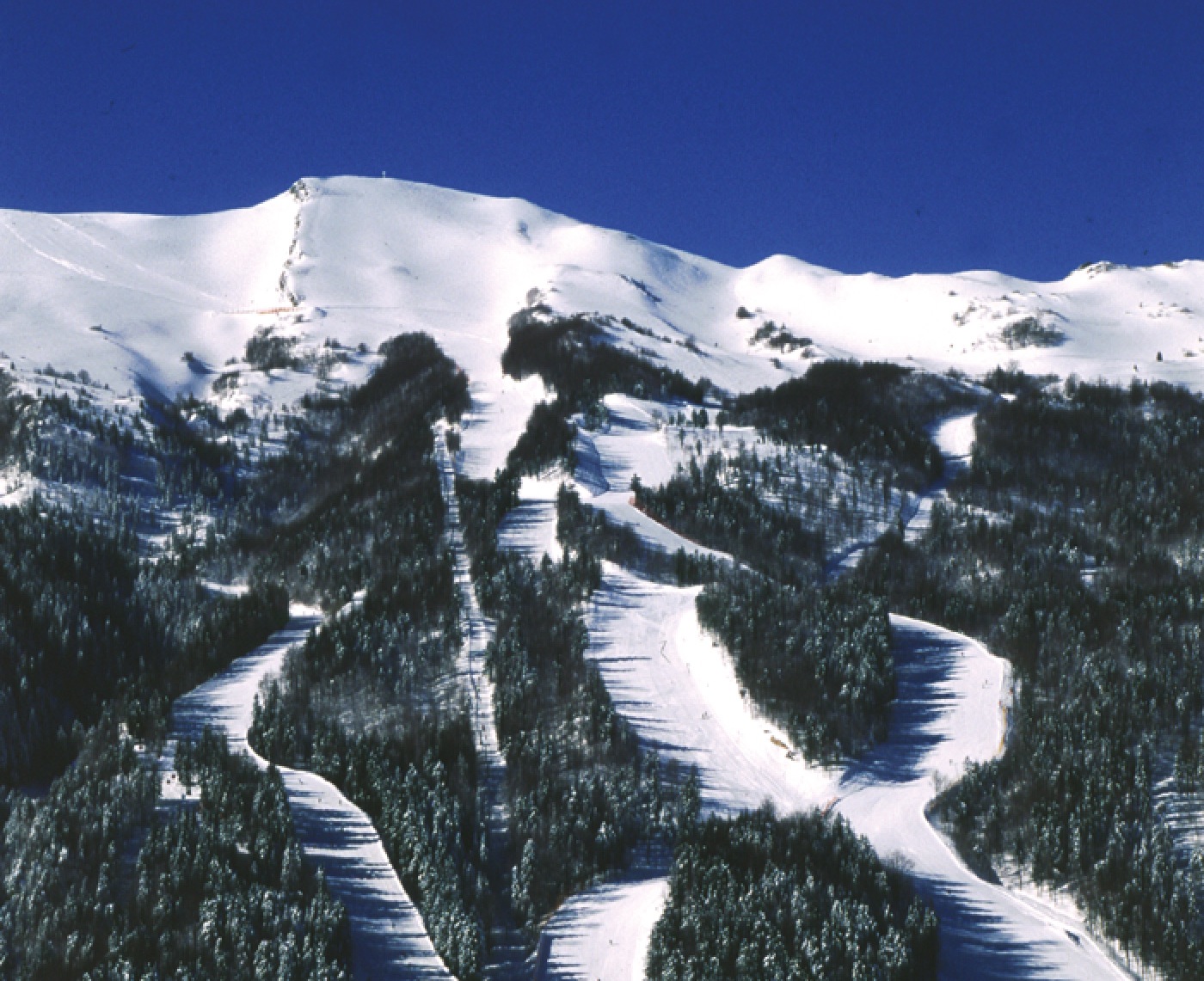 Abetone ski resort in Tuscany, Italy - panoramic view of ski slopes and mountain facilities