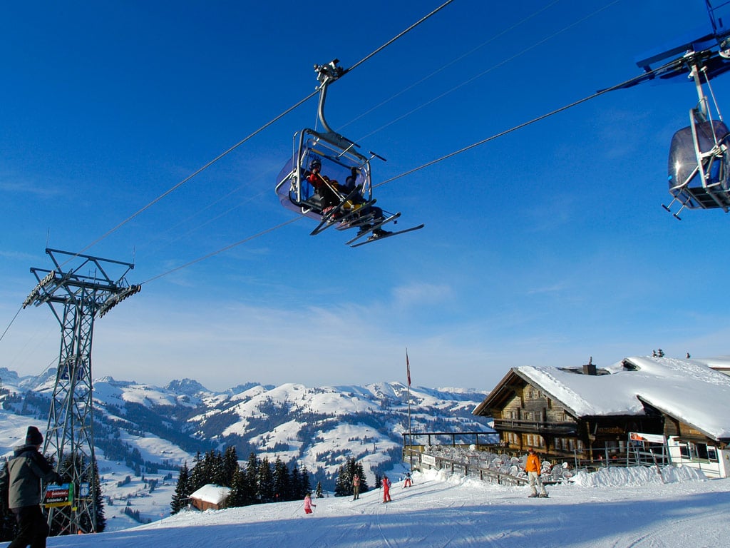 Château-d Oex ski resort in Vaud, Switzerland - panoramic view of ski slopes and mountain facilities