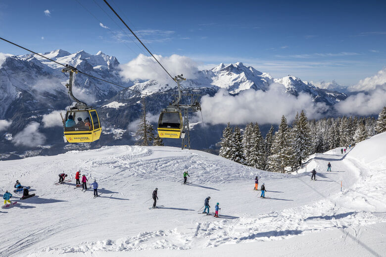 Hasliberg-Meiringen ski resort in Bernese Oberland, Switzerland - panoramic view of ski slopes and mountain facilities