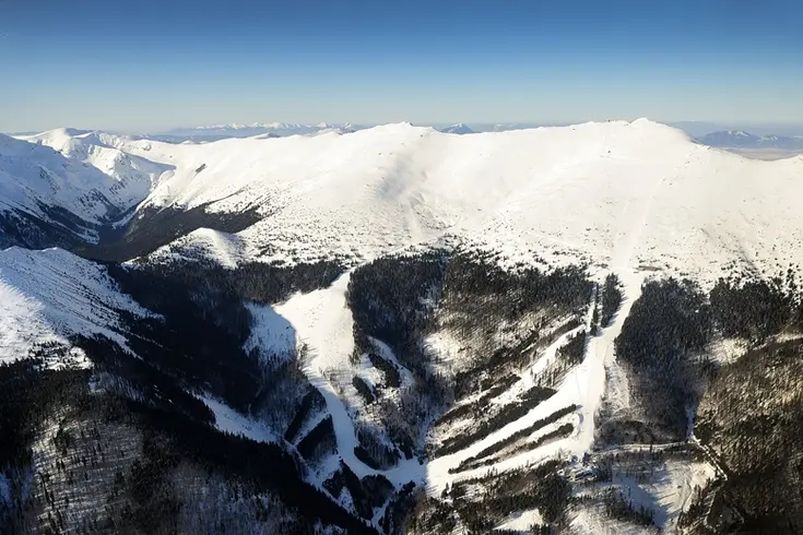 Chopok-Juh ski resort in Low Tatras, Slovakia - panoramic view of ski slopes and mountain facilities