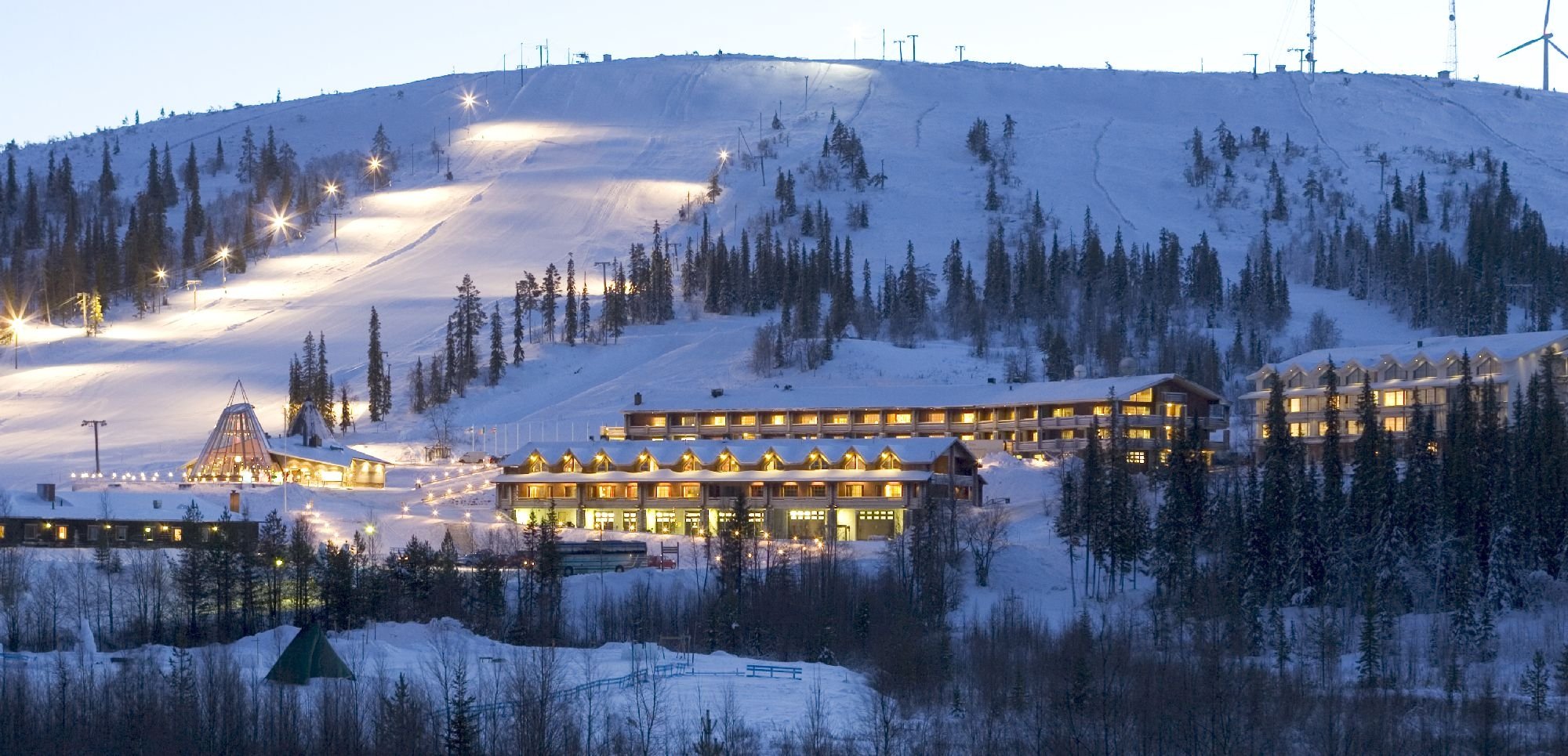 Olos ski resort in Muonio, Lapland, Finland - panoramic view of ski slopes and mountain facilities