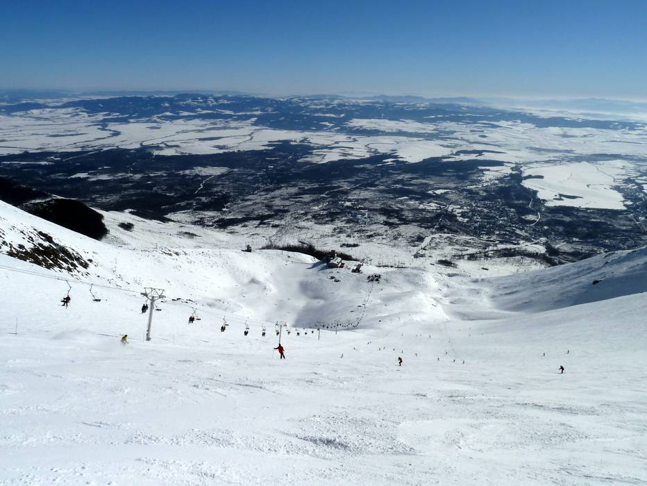 Tatranská Lomnica ski resort in High Tatras, Slovakia - panoramic view of ski slopes and mountain facilities