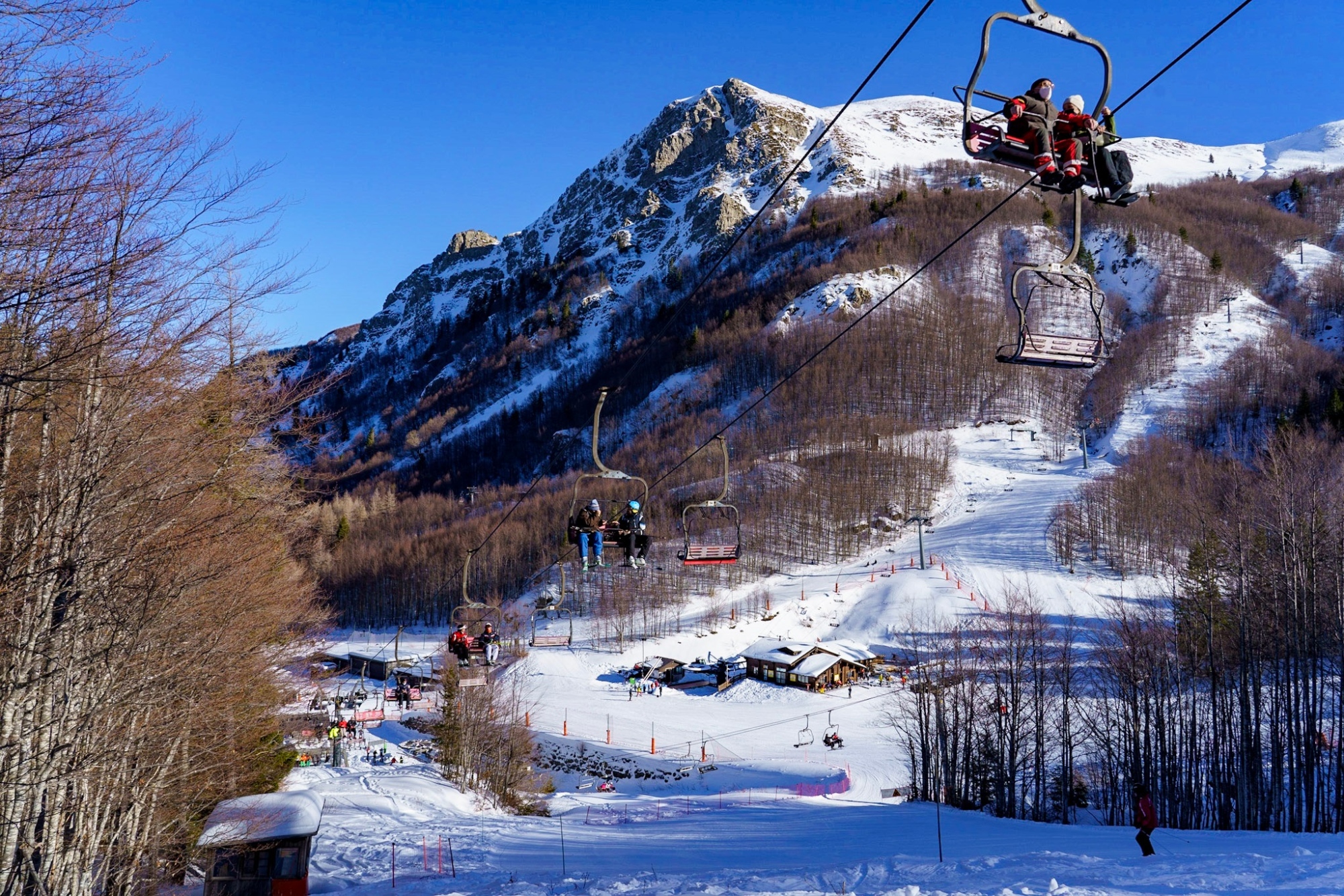 Abetone Val di Luce ski resort in Tuscany, Italy - panoramic view of ski slopes and mountain facilities