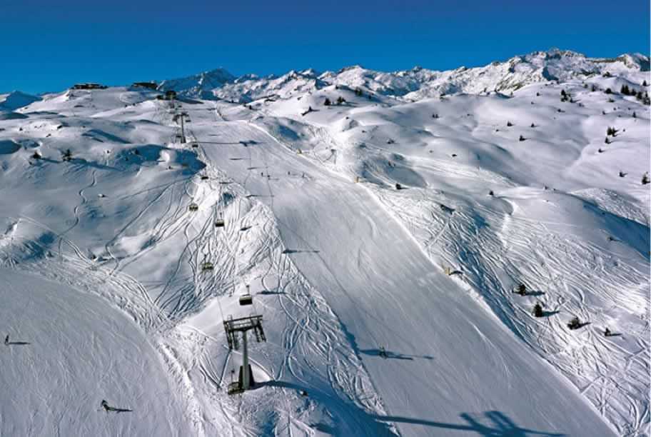 Alpe Cimbra Lavarone ski resort in Trentino, Italy - panoramic view of ski slopes and mountain facilities