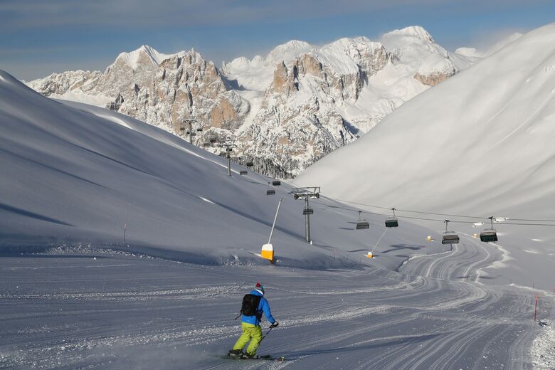 Bellamonte Alpe Lusia ski resort in Trentino, Italy - panoramic view of ski slopes and mountain facilities