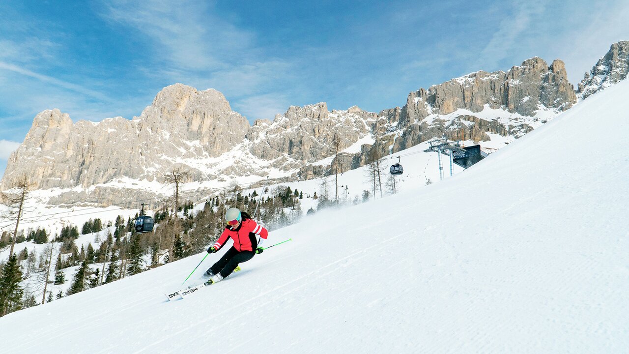 Carezza Dolomites ski resort in South Tyrol, Italy - panoramic view of ski slopes and mountain facilities