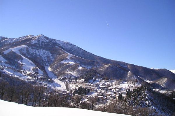 Frabosa Soprana ski resort in Piedmont, Italy - panoramic view of ski slopes and mountain facilities