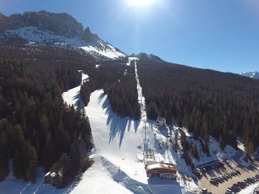 Misurina ski resort in Veneto, Italy - panoramic view of ski slopes and mountain facilities