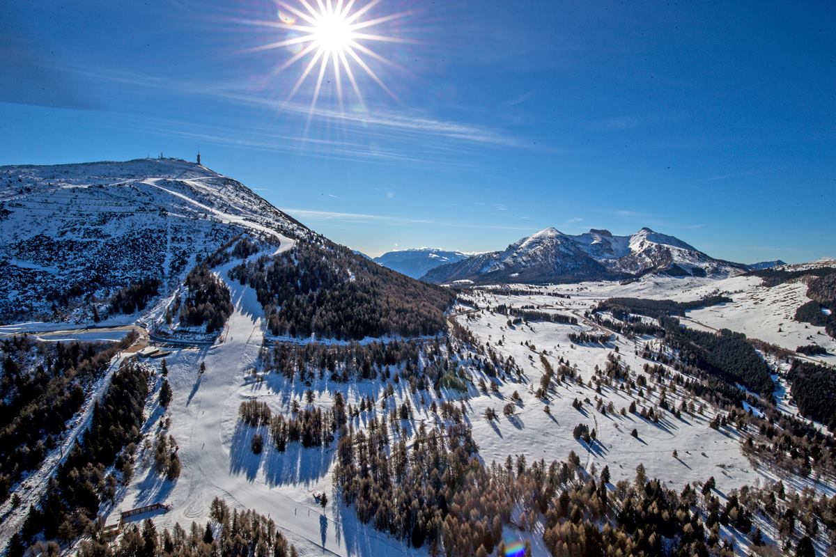 Monte Bondone ski resort in Trentino, Italy - panoramic view of ski slopes and mountain facilities