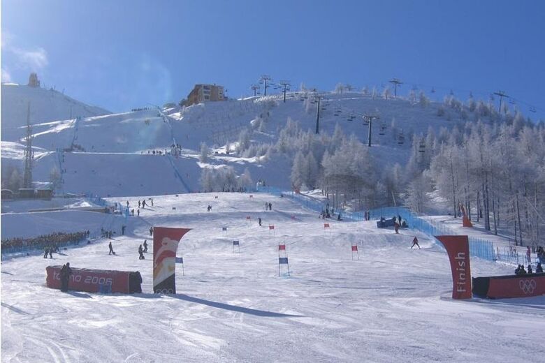 Prali ski resort in Piedmont, Italy - panoramic view of ski slopes and mountain facilities