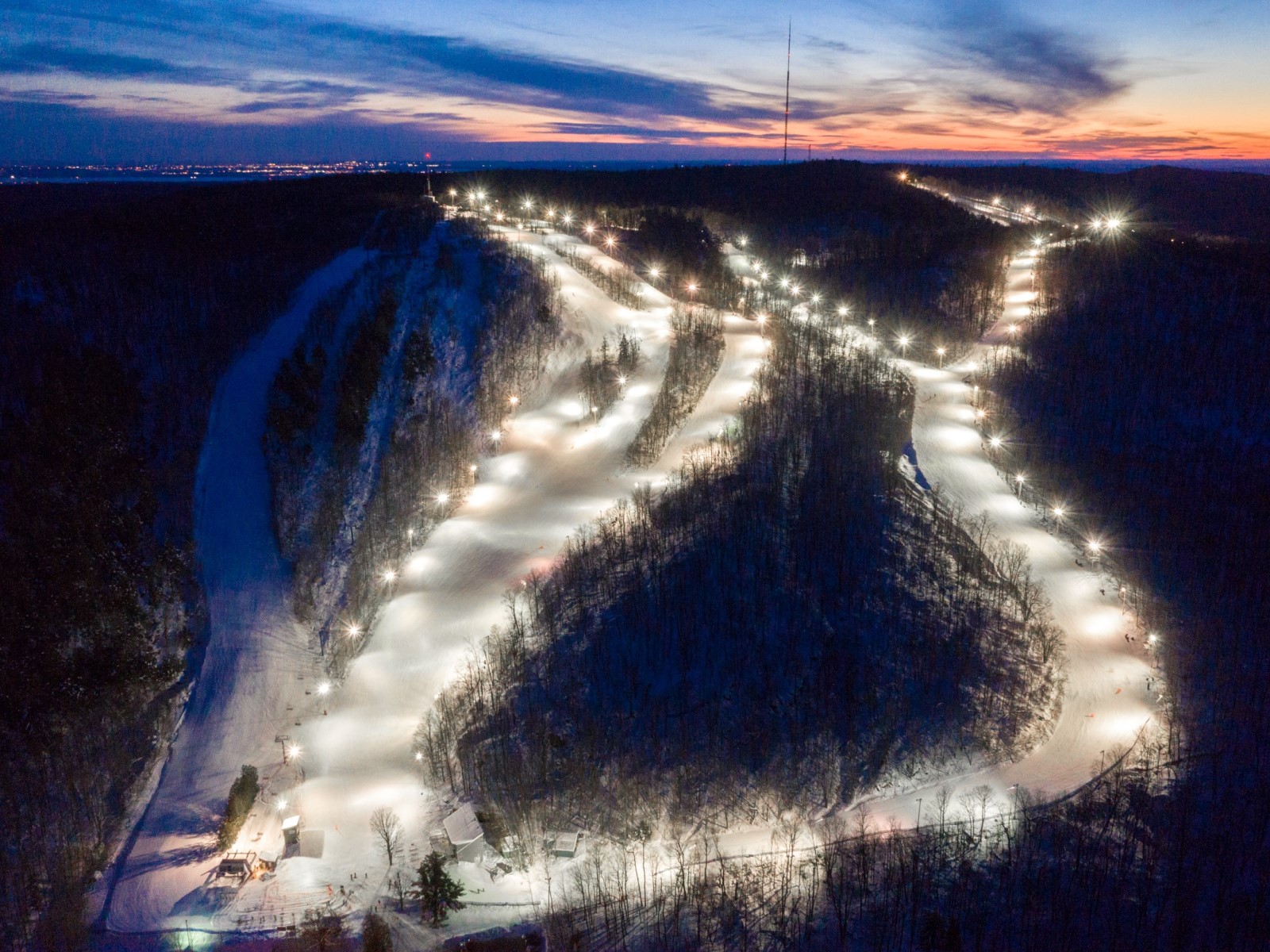 Camp Fortune ski resort in Quebec, Canada - panoramic view of ski slopes and mountain facilities