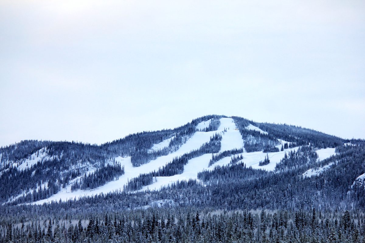 Mount Sima ski resort in Yukon, Canada - panoramic view of ski slopes and mountain facilities