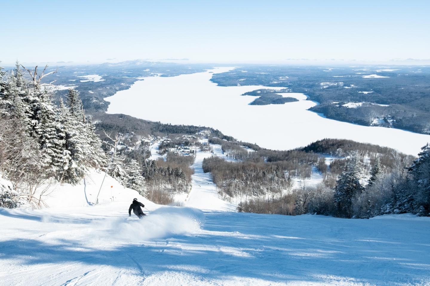 Owl’s Head ski resort in Quebec, Canada - panoramic view of ski slopes and mountain facilities
