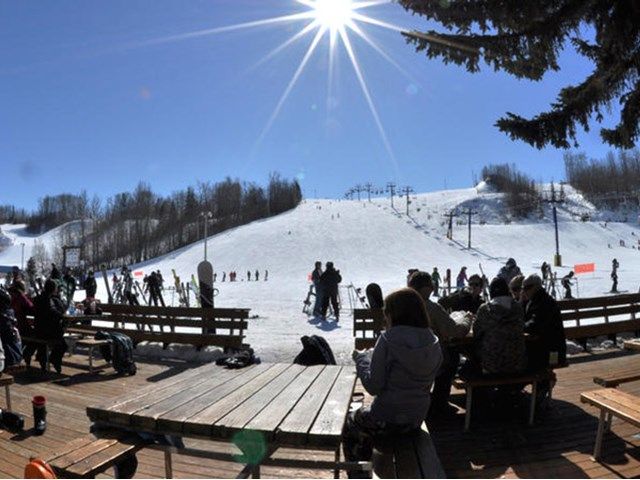 Rabbit Hill Snow Resort ski resort in Alberta, Canada - panoramic view of ski slopes and mountain facilities