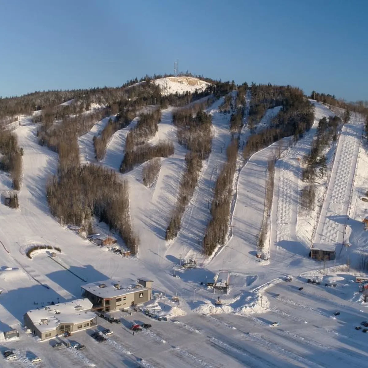 Val Saint-Côme ski resort in Quebec, Canada - panoramic view of ski slopes and mountain facilities