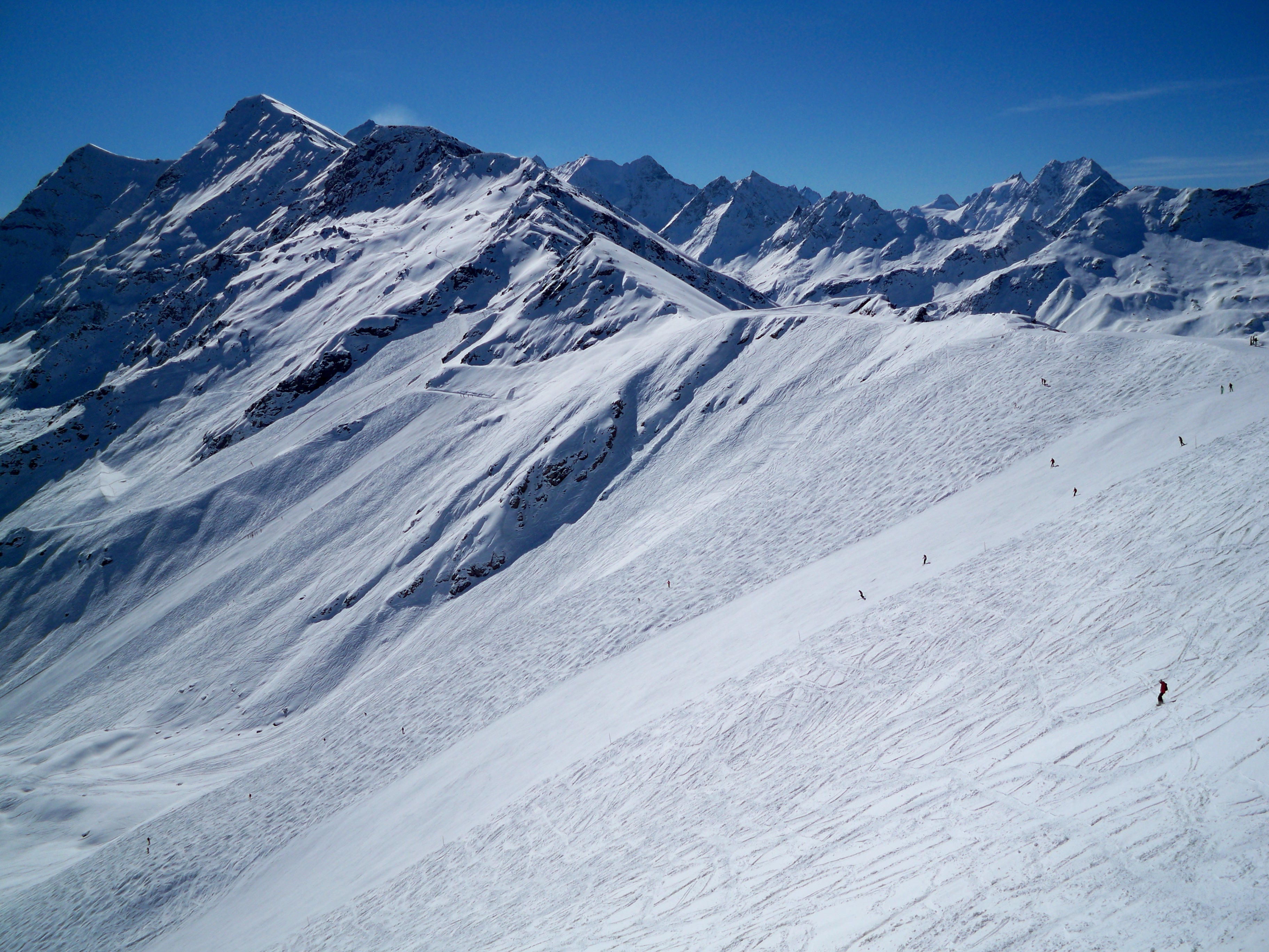 Zinal ski resort in Val d’Anniviers, Valais, Switzerland - panoramic view of ski slopes and mountain facilities