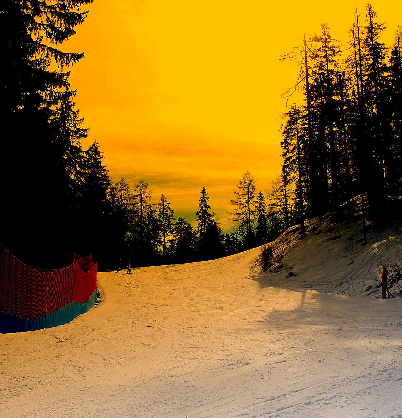 Canazei ski resort in Trentino, Italy - panoramic view of ski slopes and mountain facilities