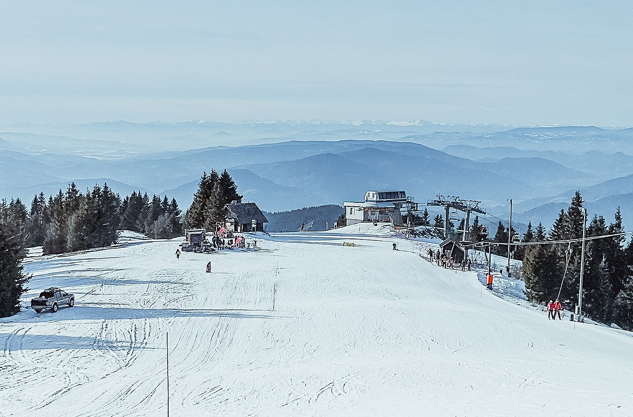 Kope ski resort in Styria, Slovenia - panoramic view of ski slopes and mountain facilities