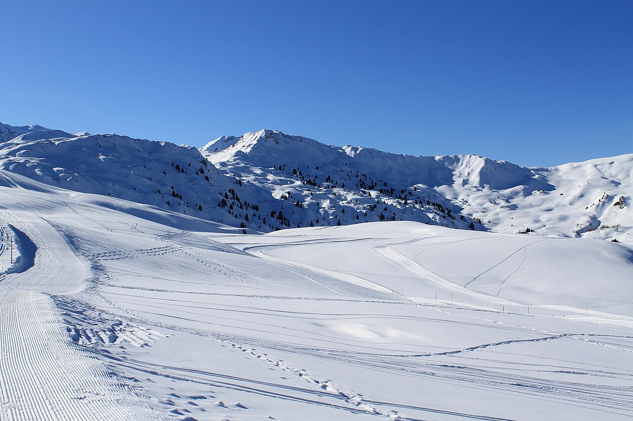Lenk im Simmental ski resort in Bern, Switzerland - panoramic view of ski slopes and mountain facilities
