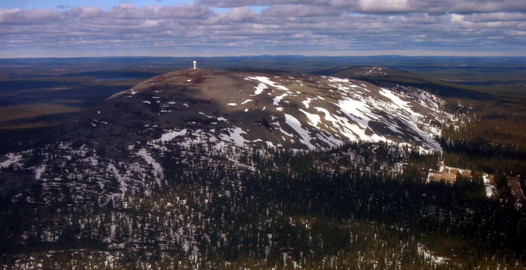 Luosto ski resort in Sodankylä, Finnish Lapland, Finland - panoramic view of ski slopes and mountain facilities