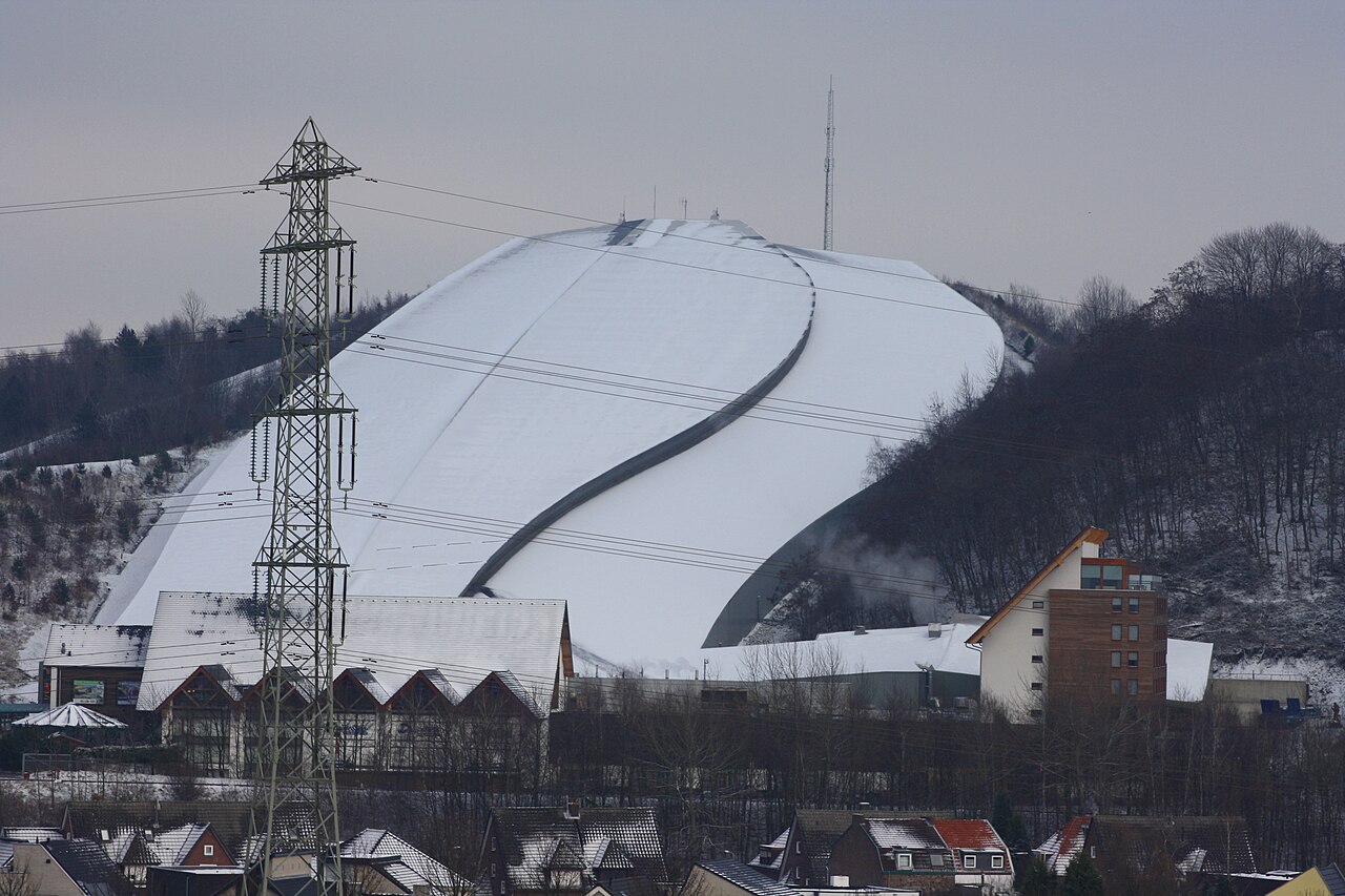 SnowWorld Landgraaf ski resort in Landgraaf, Netherlands - panoramic view of ski slopes and mountain facilities